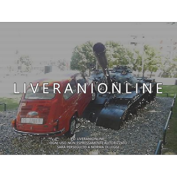 OSJEK CROAZIA 2015 NELLA FOTO Scritto sulla targa del monumento << Il 27 giugno, 1991 il carro armato del grande aggressore Serbo, distrusse la fiat rossa che fu parcheggiata in difesa di questo incrocio dal nostro cittadino Branko Breskic. In memoria della resistenza, della difesa e della vittoria sulla guerra imposta, questa installazione artistica  stata eretta dai cittadini della inconquistata cittˆ di Osijek. AG ALDO LIVERANI SAS