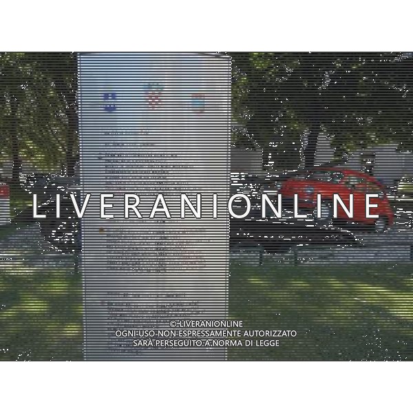 OSJEK CROAZIA 2015 NELLA FOTO Scritto sulla targa del monumento << Il 27 giugno, 1991 il carro armato del grande aggressore Serbo, distrusse la fiat rossa che fu parcheggiata in difesa di questo incrocio dal nostro cittadino Branko Breskic. In memoria della resistenza, della difesa e della vittoria sulla guerra imposta, questa installazione artistica  stata eretta dai cittadini della inconquistata cittˆ di Osijek. AG ALDO LIVERANI SAS