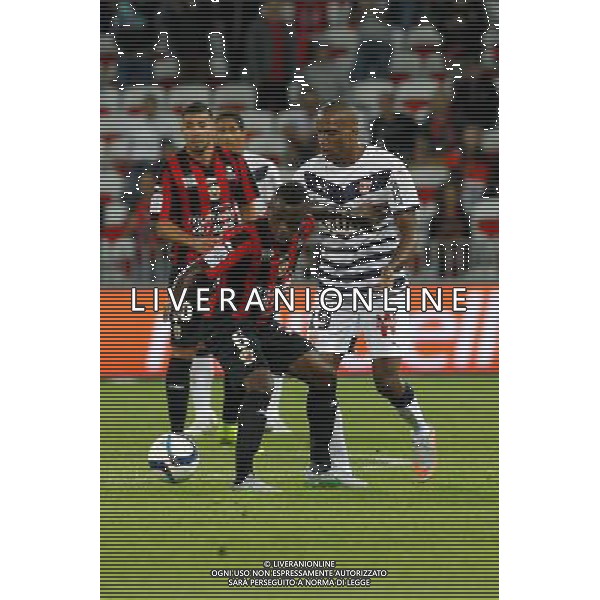 Jean Michael Seri / Nicolas Maurice Belay - 23.09.2015 - Nice / Bordeaux - 7eme journee de Ligue 1 Photo : Sebastien Nogier / Icon Sport /AGENZIA ALDO LIVERANI Sas - ITALY ONLY - EDITORIAL USE ONLY