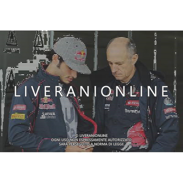 (L to R): Carlos Sainz Jr (ESP) Scuderia Toro Rosso with Franz Tost (AUT) Scuderia Toro Rosso Team Principal. 24.09.2015. Formula 1 World Championship, Rd 14, Japanese Grand Prix, Suzuka, Japan, Preparation Day. AG ALDO LIVERANI SAS ONLY ITALY