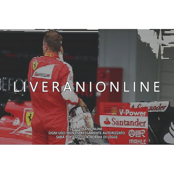 Sebastian Vettel (GER) Ferrari in qualifying parc ferme. 26.09.2015. Formula 1 World Championship, Rd 14, Japanese Grand Prix, Suzuka, Japan, Qualifying Day. AG ALDO LIVERANI SAS ONLY ITALY