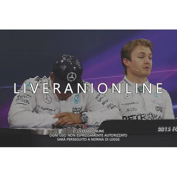 (L to R): Lewis Hamilton (GBR) Mercedes AMG F1 with Nico Rosberg (GER) Mercedes AMG F1 in the post qualifying FIA Press Conference. 26.09.2015. Formula 1 World Championship, Rd 14, Japanese Grand Prix, Suzuka, Japan, Qualifying Day. AG ALDO LIVERANI SAS ONLY ITALY