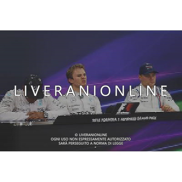 The post qualifying FIA Press Conference (L to R): Lewis Hamilton (GBR) Mercedes AMG F1, second; Nico Rosberg (GER) Mercedes AMG F1, pole position; Valtteri Bottas (FIN) Williams, third. 26.09.2015. Formula 1 World Championship, Rd 14, Japanese Grand Prix, Suzuka, Japan, Qualifying Day. AG ALDO LIVERANI SAS ONLY ITALY