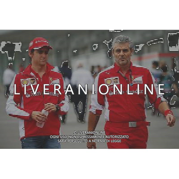 (L to R): Esteban Gutierrez (MEX) Ferrari Test and Reserve Driver with Maurizio Arrivabene (ITA) Ferrari Team Principal. 27.09.2015. Formula 1 World Championship, Rd 14, Japanese Grand Prix, Suzuka, Japan, Race Day. AG ALDO LIVERANI SAS ONLY ITALY