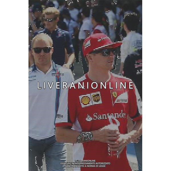 Kimi Raikkonen (FIN) Ferrari and Valtteri Bottas (FIN) Williams on the drivers parade. 27.09.2015. Formula 1 World Championship, Rd 14, Japanese Grand Prix, Suzuka, Japan, Race Day. AG ALDO LIVERANI SAS ONLY ITALY