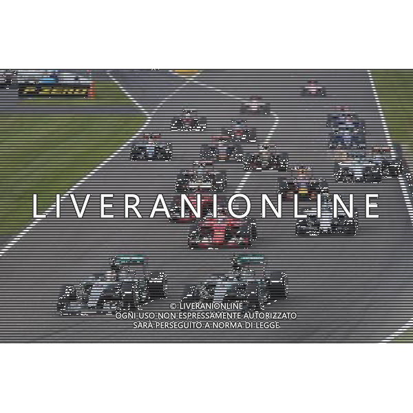 (L to R): Lewis Hamilton (GBR) Mercedes AMG F1 W06 and Nico Rosberg (GER) Mercedes AMG F1 W06 lead at the start of the race. 27.09.2015. Formula 1 World Championship, Rd 14, Japanese Grand Prix, Suzuka, Japan, Race Day. AG ALDO LIVERANI SAS ONLY ITALY