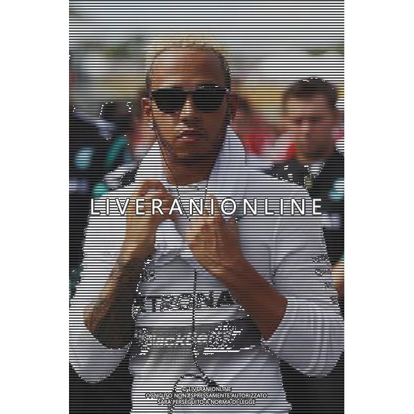 Lewis Hamilton (GBR) Mercedes AMG F1 on the grid. 27.09.2015. Formula 1 World Championship, Rd 14, Japanese Grand Prix, Suzuka, Japan, Race Day. AG ALDO LIVERANI SAS ONLY ITALY