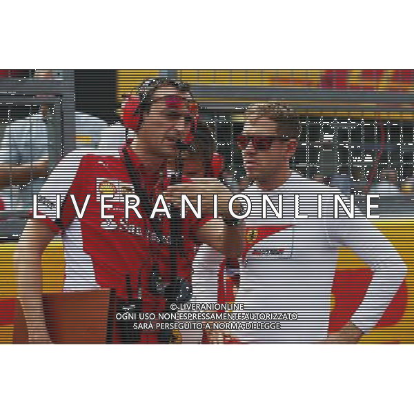 Sebastian Vettel (GER) Ferrari with Riccardo Adami (ITA) Ferrari Race Engineer on the grid. 27.09.2015. Formula 1 World Championship, Rd 14, Japanese Grand Prix, Suzuka, Japan, Race Day. AG ALDO LIVERANI SAS ONLY ITALY