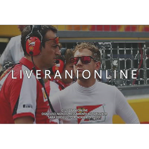 Sebastian Vettel (GER) Ferrari with Riccardo Adami (ITA) Ferrari Race Engineer on the grid. 27.09.2015. Formula 1 World Championship, Rd 14, Japanese Grand Prix, Suzuka, Japan, Race Day. AG ALDO LIVERANI SAS ONLY ITALY