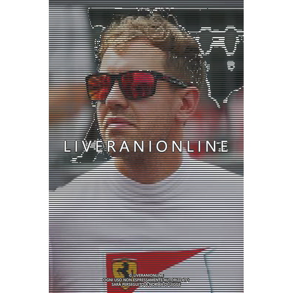 Sebastian Vettel (GER) Ferrari on the grid. 27.09.2015. Formula 1 World Championship, Rd 14, Japanese Grand Prix, Suzuka, Japan, Race Day. AG ALDO LIVERANI SAS ONLY ITALY
