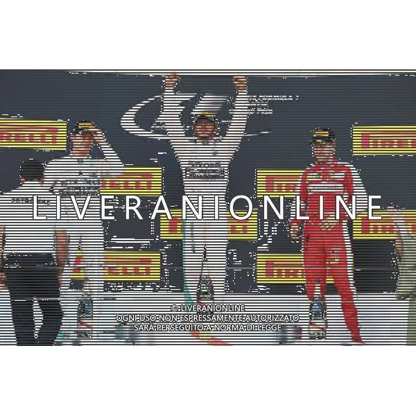 The podium (L to R): Nico Rosberg (GER) Mercedes AMG F1, second; Lewis Hamilton (GBR) Mercedes AMG F1, race winner; Sebastian Vettel (GER) Ferrari, race winner. 27.09.2015. Formula 1 World Championship, Rd 14, Japanese Grand Prix, Suzuka, Japan, Race Day. AG ALDO LIVERANI SAS ONLY ITALY