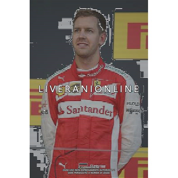 3rd place Sebastian Vettel (GER) Ferrari. 27.09.2015. Formula 1 World Championship, Rd 14, Japanese Grand Prix, Suzuka, Japan, Race Day. AG ALDO LIVERANI SAS ONLY ITALY