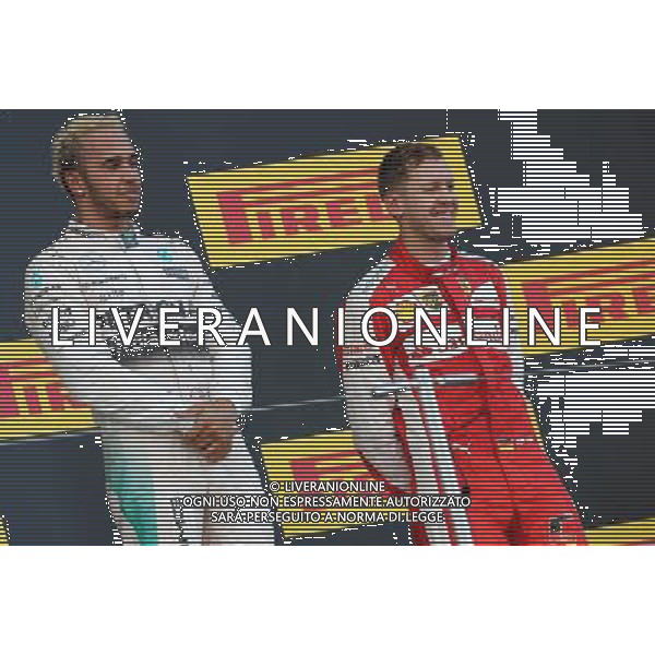 Lewis Hamilton (GBR), Mercedes AMG F1 Team and Sebastian Vettel (GER), Scuderia Ferrari 27.09.2015. Formula 1 World Championship, Rd 14, Japanese Grand Prix, Suzuka, Japan, Race Day. AG ALDO LIVERANI SAS ONLY ITALY
