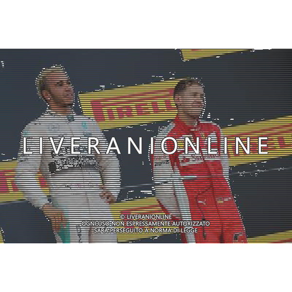 Lewis Hamilton (GBR), Mercedes AMG F1 Team and Sebastian Vettel (GER), Scuderia Ferrari 27.09.2015. Formula 1 World Championship, Rd 14, Japanese Grand Prix, Suzuka, Japan, Race Day. AG ALDO LIVERANI SAS ONLY ITALY