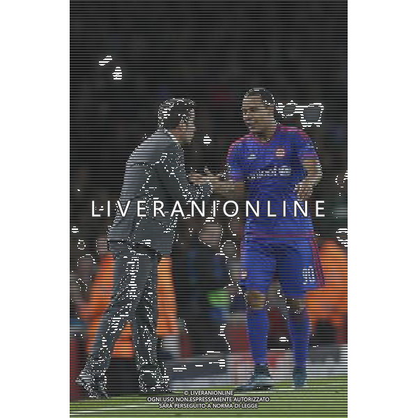 Olympiakos\' Filipe Pardo celebrates with Olympiakos manager Marco Silva after scoring the opening goal Photographer Craig Mercer/CameraSport Football - UEFA Champions League Group F - Arsenal v Olympiakos - Tuesday 29th September 2015 - Emirates Stadium - London - © CameraSport - 43 Linden Ave. Countesthorpe. Leicester. England. LE8 5PG - Tel: +44 (0) 116 277 4147 - admin@camerasport.com - www.camerasport.com AG ALDO LIVERANI SAS ONLY ITALY