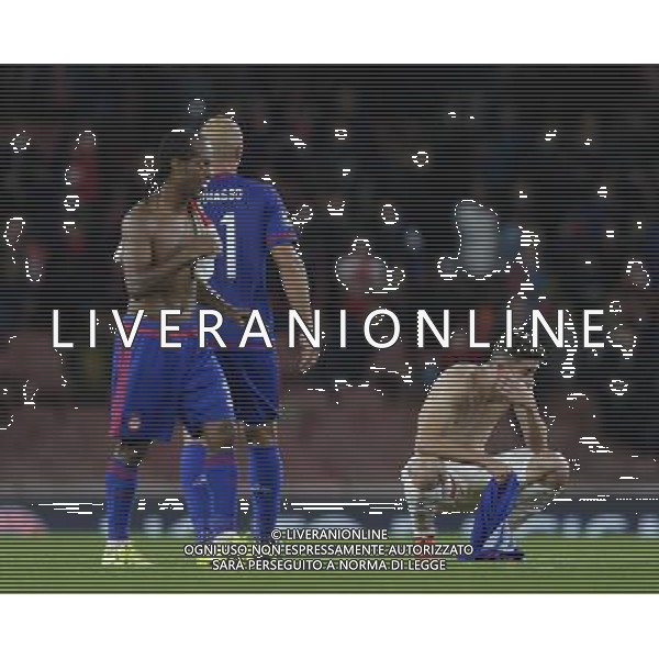 Arsenal\'s Gabriel Paulista looks dejected at full time - final score 2-3 Photographer Craig Mercer/CameraSport Football - UEFA Champions League Group F - Arsenal v Olympiakos - Tuesday 29th September 2015 - Emirates Stadium - London - © CameraSport - 43 Linden Ave. Countesthorpe. Leicester. England. LE8 5PG - Tel: +44 (0) 116 277 4147 - admin@camerasport.com - www.camerasport.com AG ALDO LIVERANI SAS ONLY ITALY