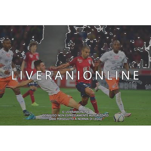 Mounir OBBADI / Rami BENSEBAINI - 02.10.2015 - Lille / Montpellier - 9eme journee de Ligue 1 Photo : Dave Winter / Icon Sport AG ALDO LIVERANI SAS ONLY ITALY