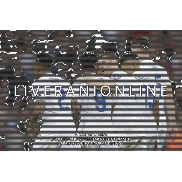 EnglandÕs James Milner (centre) congratulates Raheem Sterling on scoring his side\'s second goal Photographer Craig Mercer/CameraSport International Football - UEFA EURO 2016 - European Qualifiers Group E - England v Estonia - Friday 9th October 2015 - Wembley Stadium - London © CameraSport - 43 Linden Ave. Countesthorpe. Leicester. England. LE8 5PG - Tel: +44 (0) 116 277 4147 - admin@camerasport.com - www.camerasport.com /Agenzia Aldo Liverani s.a.s.