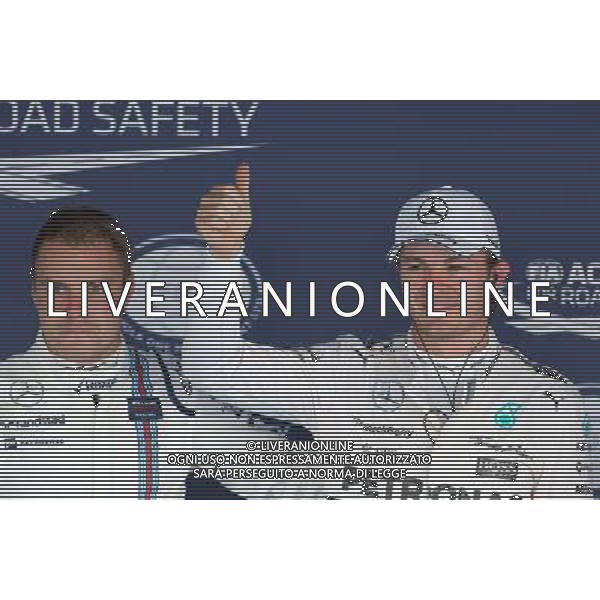 Valtteri Bottas (FIN), Williams F1 Team and Nico Rosberg (GER), Mercedes AMG F1 Team 10.10.2015. Formula 1 World Championship, Rd 15, Russian Grand Prix, Sochi Autodrom, Sochi, Russia, Qualifying Day. - www.xpbimages.com, EMail: requests@xpbimages.com - copy of publication required for printed pictures. Every used picture is fee-liable. © Copyright: Charniaux / XPB Images /Agenzia Aldo Liverani s.a.s.