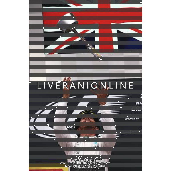 Race winner Lewis Hamilton (GBR) Mercedes AMG F1 celebrates on the podium. 11.10.2015. Formula 1 World Championship, Rd 15, Russian Grand Prix, Sochi Autodrom, Sochi, Russia, Race Day. - www.xpbimages.com, EMail: requests@xpbimages.com - copy of publication required for printed pictures. Every used picture is fee-liable. © Copyright: Batchelor / XPB Images /Agenzia Aldo Liverani s.a.s.
