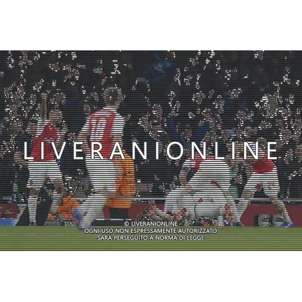 Arsenal players celebrate their second goal Photographer Craig Mercer/CameraSport Football - UEFA Champions League Group F - Arsenal v Bayern Munich - Tuesday 20th October 2015 - The Emirates Stadium - London - Â© CameraSport - 43 Linden Ave. Countesthorpe. Leicester. England. LE8 5PG - Tel: +44 (0) 116 277 4147 - admin@camerasport.com - www.camerasport.com/AGENZIA ALDO LIVERANI SAS - ITALY ONLY EDITORIAL USE ONLY
