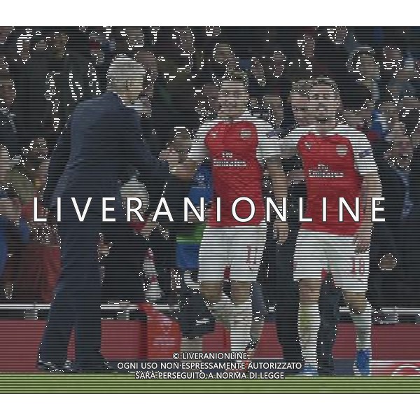Arsenal\'s Mesut Ozil is congratulated by Arsenal manager ArsÃ¨ne Wenger after scoring his side\'s second goal to make the score 2-0 Photographer Craig Mercer/CameraSport Football - UEFA Champions League Group F - Arsenal v Bayern Munich - Tuesday 20th October 2015 - The Emirates Stadium - London - Â© CameraSport - 43 Linden Ave. Countesthorpe. Leicester. England. LE8 5PG - Tel: +44 (0) 116 277 4147 - admin@camerasport.com - www.camerasport.com/AGENZIA ALDO LIVERANI SAS - ITALY ONLY EDITORIAL USE ONLY