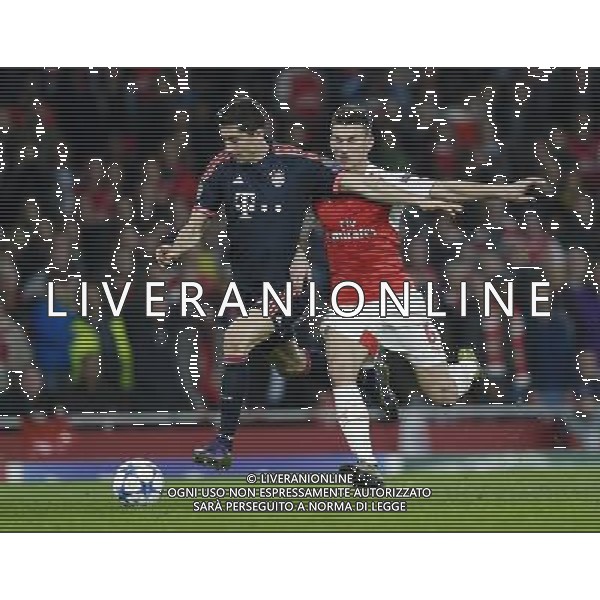 Bayern Munich\'s Robert Lewandowski holds off the challenge from Arsenal\'s Laurent Koscielny Photographer Craig Mercer/CameraSport Football - UEFA Champions League Group F - Arsenal v Bayern Munich - Tuesday 20th October 2015 - The Emirates Stadium - London - Â© CameraSport - 43 Linden Ave. Countesthorpe. Leicester. England. LE8 5PG - Tel: +44 (0) 116 277 4147 - admin@camerasport.com - www.camerasport.com/AGENZIA ALDO LIVERANI SAS - ITALY ONLY EDITORIAL USE ONLY