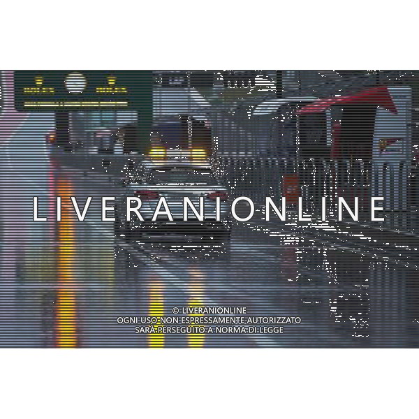 The FIA Medical Car drives through a wet and rainy pit lane. 24.10.2015. Formula 1 World Championship, Rd 16, United States Grand Prix, Austin, Texas, USA, Qualifying Day. AG ALDO LIVERANI SAS ONLY ITALY
