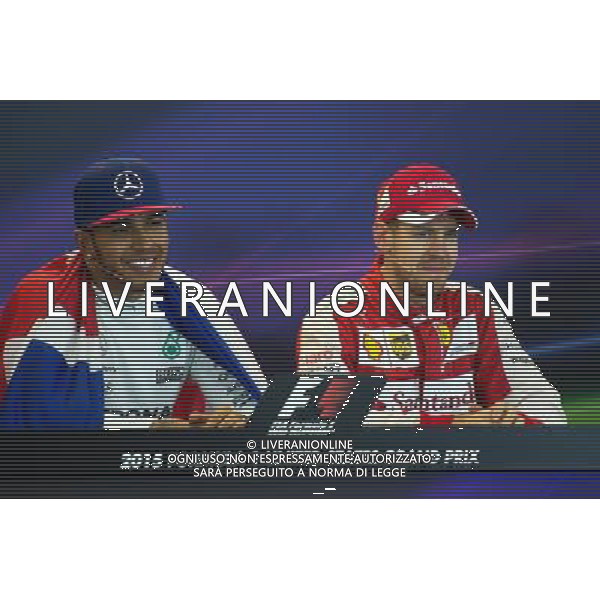 (L to R): Lewis Hamilton (GBR) Mercedes AMG F1 and Sebastian Vettel (GER) Ferrari in the FIA Press Conference. 25.10.2015. Formula 1 World Championship, Rd 16, United States Grand Prix, Austin, Texas, USA, Race Day. AG ALDO LIVERANI SAS ONLY ITALY