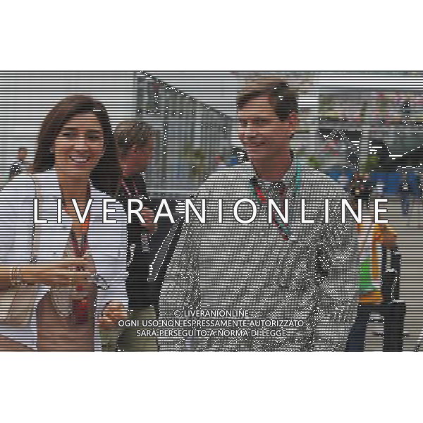 (L to R): Fabiana Flosi (BRA), wife of Bernie Ecclestone (GBR), with Tavo Hellmund (USA) Former COTA Promotor. 30.10.2015. Formula 1 World Championship, Rd 17, Mexican Grand Prix, Mexixo City, Mexico, Practice Day. AG ALDO LIVERANI SAS ONLY ITALY