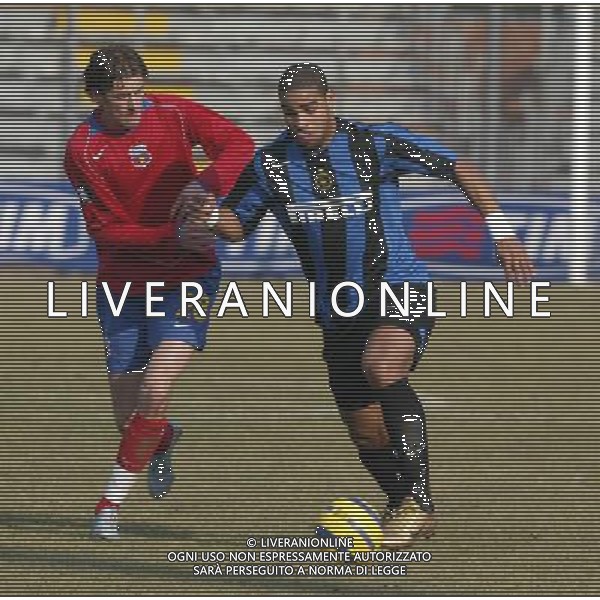 09/02/2005 PARTITA DI BENEFICENZA FRA INTER E STEAUA BUCAREST NELLA FOTO: ADRIANO E LOVIN FLORIN FOTO BARATTINI ALEXANDRO/AG. ALDO LIVERANI