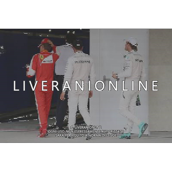 Sebastian Vettel (GER) Ferrari SF15-T with Lewis Hamilton (GBR) Mercedes AMG F1 W06 and Nico Rosberg (GER) Mercedes AMG F1 W06. 31.10.2015. Formula 1 World Championship, Rd 17, Mexican Grand Prix, Mexixo City, Mexico, Qualifying Day. /AGENZIA ALDO LIVERANI SAS - ITALY ONLY EDITORIAL USE ONLY