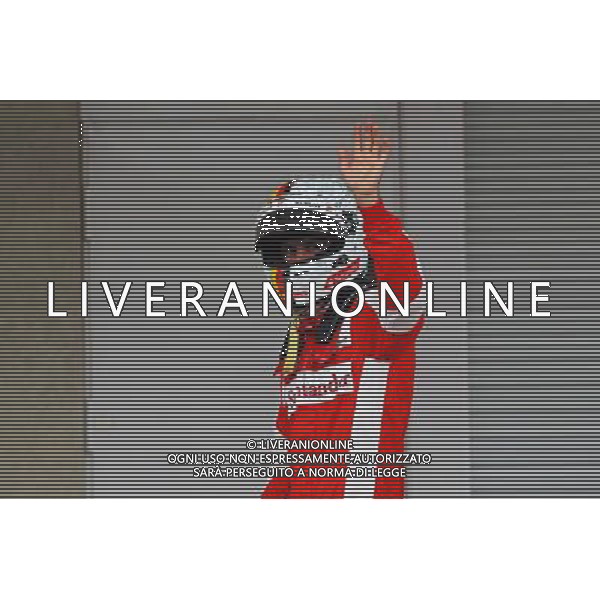 Sebastian Vettel (GER) Ferrari celebrates his third position in qualifying parc ferme. 31.10.2015. Formula 1 World Championship, Rd 17, Mexican Grand Prix, Mexixo City, Mexico, Qualifying Day. /AGENZIA ALDO LIVERANI SAS - EDITORIAL USE ONLY