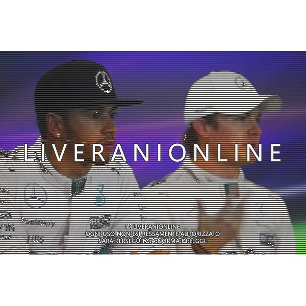 (L to R): Lewis Hamilton (GBR) Mercedes AMG F1 and team mate Nico Rosberg (GER) Mercedes AMG F1 in the post qualifying FIA Press Conference. 31.10.2015. Formula 1 World Championship, Rd 17, Mexican Grand Prix, Mexixo City, Mexico, Qualifying Day. /AGENZIA ALDO LIVERANI SAS - EDITORIAL USE ONLY