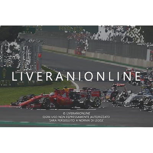 Sebastian Vettel (GER) Ferrari SF15-T and Daniel Ricciardo (AUS) Red Bull Racing RB11 make contact at the start of the race. 01.11.2015. Formula 1 World Championship, Rd 17, Mexican Grand Prix, Mexixo City, Mexico, Race Day. AG ALDO LIVERANI SAS ONLY ITALY