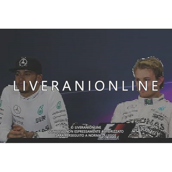 (L to R): Lewis Hamilton (GBR) Mercedes AMG F1 and race winner Nico Rosberg (GER) Mercedes AMG F1 in the post race FIA Press Conference. 01.11.2015. Formula 1 World Championship, Rd 17, Mexican Grand Prix, Mexixo City, Mexico, Race Day. AG ALDO LIVERANI SAS ONLY ITALY