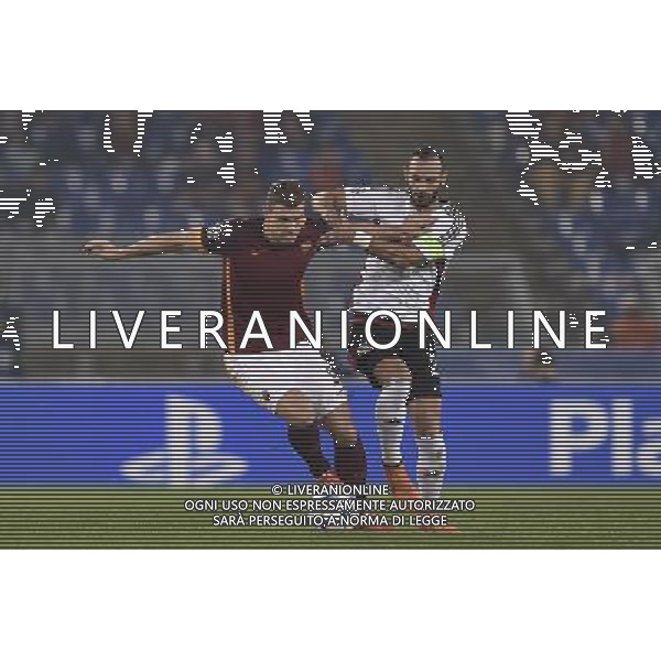 Roma - 04/11/2015 - Stadio Olimpico - Uefa Champions League 2015/2016 - Gruppo E - AS Roma vs Bayer Leverkusen - nella foto: Edin Dzeko e Omer Toprak / Ph Fabrizio Corradetti - Ag. Aldo Liverani sas /Agenzia Aldo Liverani S.a.s.