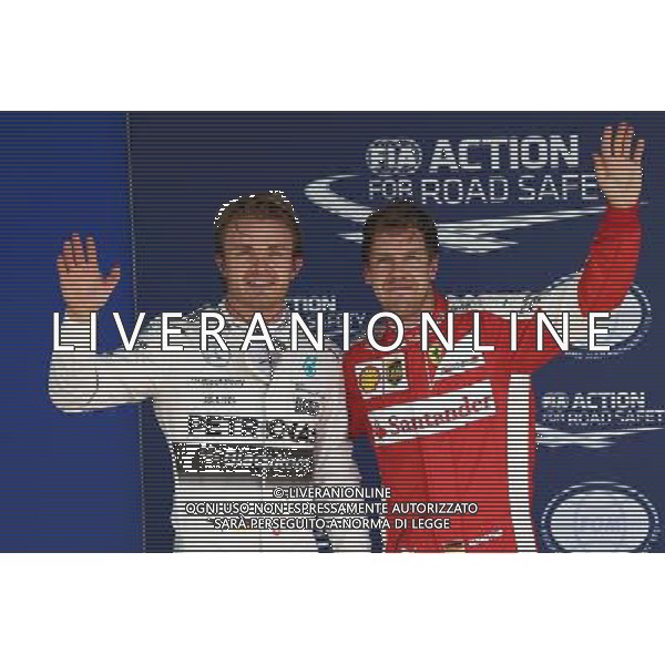 Pole for Nico Rosberg (GER) Mercedes and 3rd for Sebastian Vettel (GER) Ferrari. 14.11.2015. Formula 1 World Championship, Rd 18, Brazilian Grand Prix, Sao Paulo, Brazil, Qualifying Day. - www.xpbimages.com, EMail: requests@xpbimages.com - copy of publication required for printed pictures. Every used picture is fee-liable. Â© Copyright: Batchelor / XPB Images ONLY ITALY/Agenzia Aldo Liverani s.a.s.