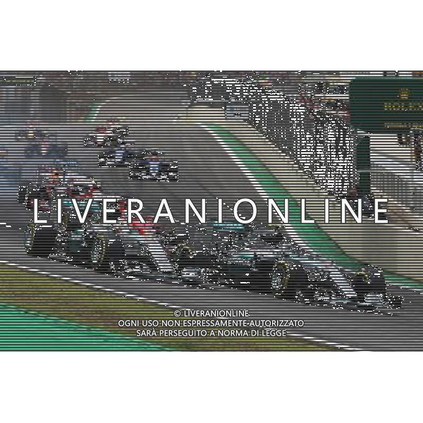 Nico Rosberg (GER) Mercedes AMG F1 W06 leads team mate Lewis Hamilton (GBR) Mercedes AMG F1 W06 at the start of the race. 15.11.2015. Formula 1 World Championship, Rd 18, Brazilian Grand Prix, Sao Paulo, Brazil, Race Day. AG ALDO LIVERANI SAS ONLY ITALY