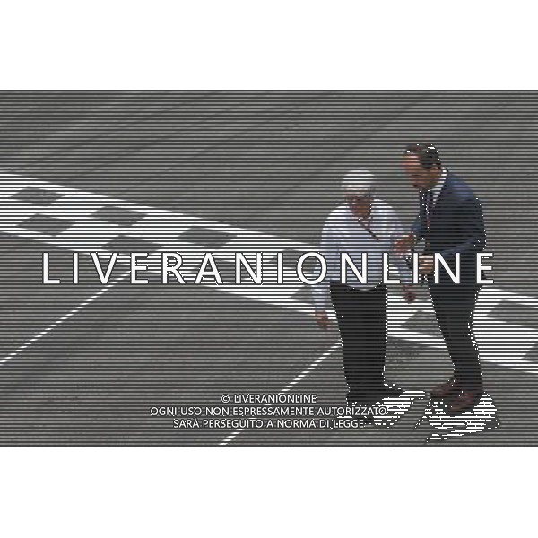 Bernie Ecclestone (GBR) with Alex Molina, Allsport Management, on the grid. 15.11.2015. Formula 1 World Championship, Rd 18, Brazilian Grand Prix, Sao Paulo, Brazil, Race Day. AG ALDO LIVERANI SAS ONLY ITALY