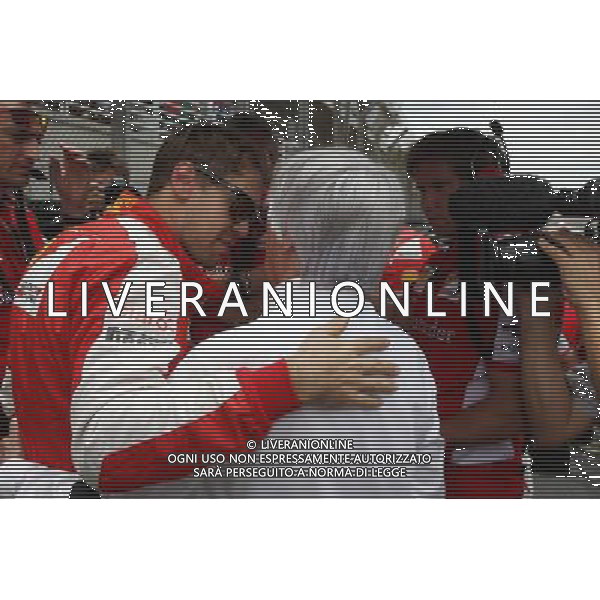(L to R): Sebastian Vettel (GER) Ferrari with Bernie Ecclestone (GBR) on the grid. 15.11.2015. Formula 1 World Championship, Rd 18, Brazilian Grand Prix, Sao Paulo, Brazil, Race Day. AG ALDO LIVERANI SAS ONLY ITALY