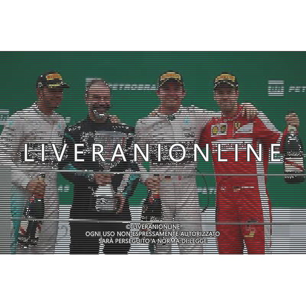 1st place Nico Rosberg (GER) Mercedes AMG F1 W06, 2nd place Lewis Hamilton (GBR) Mercedes AMG F1 and 3rd place Sebastian Vettel (GER) Ferrari SF15-T. 15.11.2015. Formula 1 World Championship, Rd 18, Brazilian Grand Prix, Sao Paulo, Brazil, Race Day. AG ALDO LIVERANI SAS ONLY ITALY