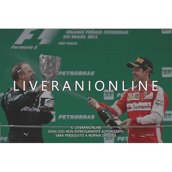 James Waddell, Mercedes AMG F1 with Sebastian Vettel (GER) Ferrari SF15-T. 15.11.2015. Formula 1 World Championship, Rd 18, Brazilian Grand Prix, Sao Paulo, Brazil, Race Day. AG ALDO LIVERANI SAS ONLY ITALY