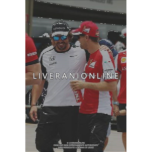 (L to R): Fernando Alonso (ESP) McLaren with Sebastian Vettel (GER) Ferrari on the drivers parade. 15.11.2015. Formula 1 World Championship, Rd 18, Brazilian Grand Prix, Sao Paulo, Brazil, Race Day. /AGENZIA ALDO LIVERANI Sas - ITALY ONLY - EDITORIAL USE ONLY - GP BRASILE F1 SAN PAOLO