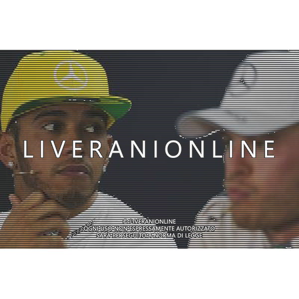 (L to R): Lewis Hamilton (GBR) Mercedes AMG F1 and team mate Nico Rosberg (GER) Mercedes AMG F1 in the FIA Press Conference. 15.11.2015. Formula 1 World Championship, Rd 18, Brazilian Grand Prix, Sao Paulo, Brazil, Race Day. /AGENZIA ALDO LIVERANI Sas - ITALY ONLY - EDITORIAL USE ONLY - GP BRASILE F1 SAN PAOLO