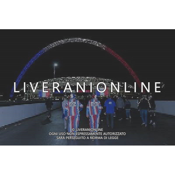 Fans with pictures commemorating the Paris terrorist attacks arrive at an illuminated Wembley Stadium, home of England football Photographer Craig Mercer/CameraSport Football International - England v France - Tuesday 17th November 2015 - Wembley Stadium - London © CameraSport - 43 Linden Ave. Countesthorpe. Leicester. England. LE8 5PG - Tel: +44 (0) 116 277 4147 - admin@camerasport.com - www.camerasport.com / AGENZIA ALDO LIVERANI SAS - ITALY ONLY EDITORIAL USE ONLY - Inghilterra Vs Francia partita amichevole