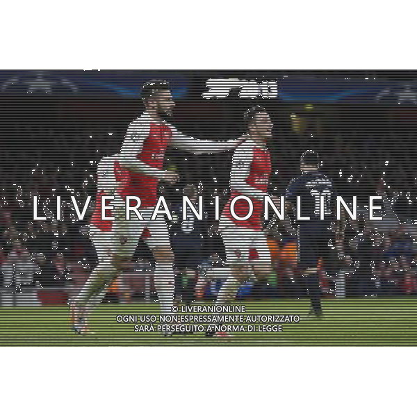 GOAL CELEBRATION - Arsenal\'s Mesut Ozil celebrates scoring the opening goal with team-mates Photographer Craig Mercer/CameraSport Football - UEFA Champions League Group F - Arsenal v Dinamo Zagreb - Tuesday 24th November 2015 - Emirates Stadium - London © CameraSport - 43 Linden Ave. Countesthorpe. Leicester. England. LE8 5PG - Tel: +44 (0) 116 277 4147 - admin@camerasport.com - www.camerasport.com AG ALDO LIVERANI SAS ONLY ITALY