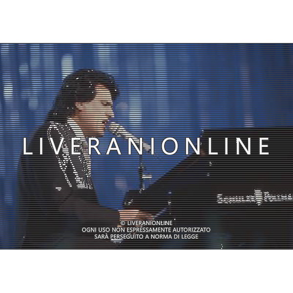Teatro Ariston di Sanremo 40mo Festival della Canzone Italiana - 1990 nella foto Toto Cutugno con la canzone \' Gli amori \' si classifica al secondo posto ©Agenzia Aldo Liverani Sas