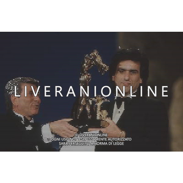 Teatro Ariston di Sanremo 40mo Festival della Canzone Italiana - 1990 nella foto Toto Cutugno con la canzone \' Gli amori \' si classifica al secondo posto ©Agenzia Aldo Liverani Sas