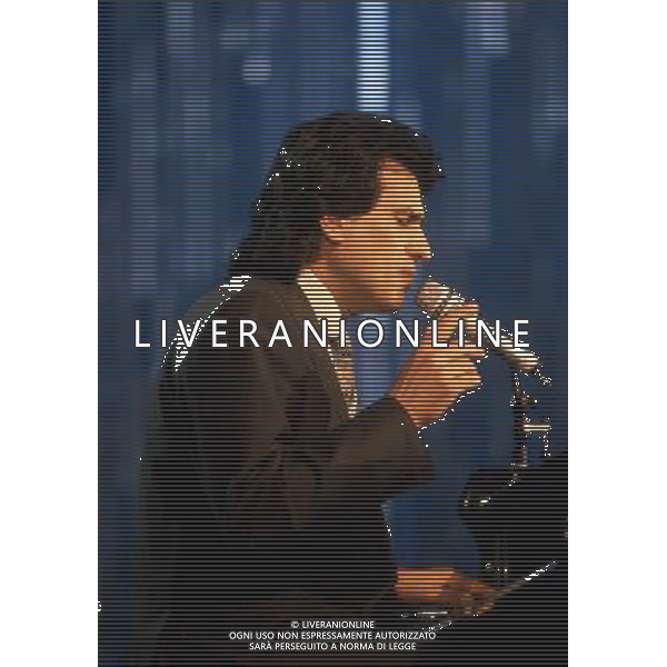Teatro Ariston di Sanremo 40mo Festival della Canzone Italiana - 1990 nella foto Toto Cutugno con la canzone \' Gli amori \' si classifica al secondo posto ©Agenzia Aldo Liverani Sas
